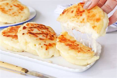  Arepas de Queso: Gustose e morbide sfogliate di grano avvolgendo un cuore cremoso di formaggio!