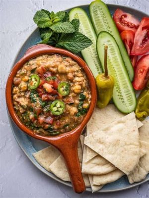  Ful Medames: Un piatto egiziano di ceci cremosi con un tocco piccante e fresco!